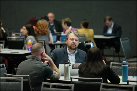 Ben Anderson engages Town Hall participants in a breakout group discussion. Photo courtesy of ASHP.