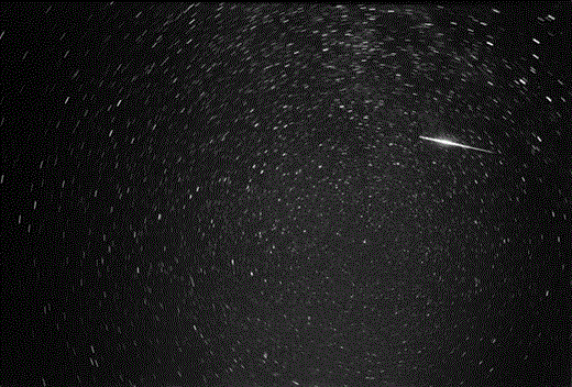 A -9 magnitude Perseid fireball imaged in double station on 12 August 1993 by our team. This 10-minute exposure was made under an extraordinarily dark sky in Peñarroya peak (Teruel, Spain). Polaris is near the centre.