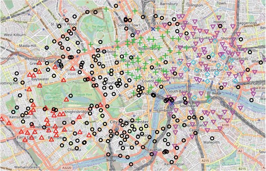 Map of London bike-sharing system, showing the geographic locations of the stations and clustering for day 1: cluster 1 (red triangles), cluster 2 (black circles), cluster 3 (green crosses), cluster 4 (dark blue crosses), cluster 5 (light blue diamonds), and cluster 6 (pink triangles).