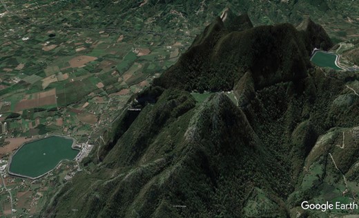 Google Earth synthetic image of a gigawatt-rated off-river PHES system [40] at Presenzano in Italy, showing the two reservoirs (upper right and lower left) with a head of 500 ms (vertical scale is exaggerated)
