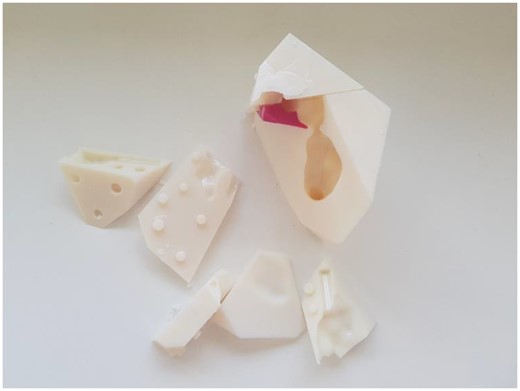 Disassembled wax cast. Note the protuberances and dents that allow reassembling.