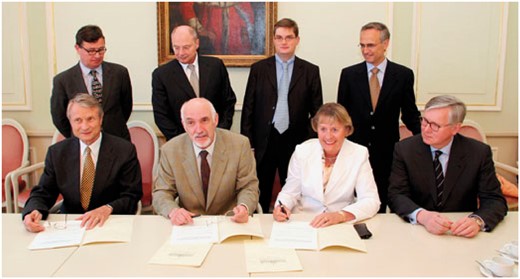 Signing of the endowment treaty for the newly established Adult Congenital Heart Disease Centre between the philanthropic funders and the Münster University Hospital (2005). Standing (L) to (R): Prof. Johannes Vogt (Chief of Paediatric Cardiology), Prof. Hans Scheld (Chief of Cardiothoracic Surgery), Mr Torben Geier (Patient Organization Representative), Prof. Günter Breithardt (Chief of Cardiology). Seated (L) to (R): Prof. Peter Osypka, Rector magnificus Prof. Jürgen Schmidt, Mrs. Karla Völlm, Prof. Wolfgang J. Kox.
