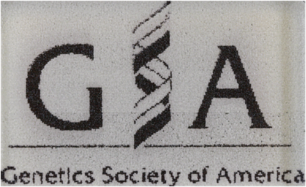 This “living logo” is made up of yeast growing on a rectangular Petri dish. The yeast strains are engineered to produce large amounts of violacein, a pigment from Chromobacterium violaceum, leading to a very dark purple that appears black here (Mitchell et al. 2015), and wild-type yeast that appear white here. The yeast cells are deposited on the plate using an acoustic droplet ejection robot, creating 25,000 “biopixels.” For more information, see www.yeastart.org.