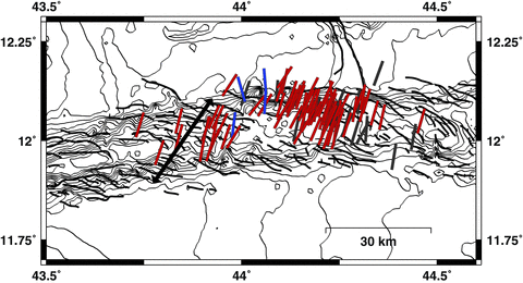 Azimuths of tension axes for the western Gulf of Aden earthquakes. Tension axes are plotted at the centroid locations, and are drawn in blue for earthquakes with large strike-slip components, and red or grey for the best constrained and less well-constrained normal-faulting earthquakes. The double-headed black arrow shows the spreading direction from the global plate motion model MORVEL (DeMets et al. 2010). Black lines show fault traces from Dauteuil et al. (2001). Bathymetry from GEBCO is plotted in 100-m contours. Tension axes are plotted in chronological order, and a single, early strike-slip event at 12.09°N, 44.2°E is obscured by later normal-faulting events.