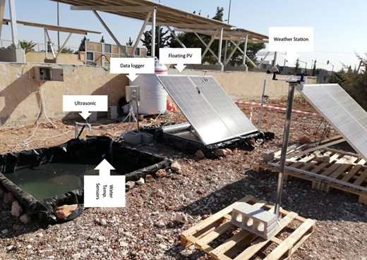 Pilot test setup with two tanks; control and covered with the floating PV panels.