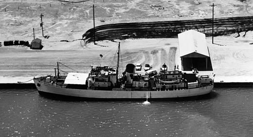 The U.S. government contracted the Mexican company Transportes Marítimos Refrigerados (Tmr) in the mid-1950s to transport deportees across the Gulf of Mexico. Tmr used the cargo vessel Mercurio, shown here in 1956, to make the 550-mile journey. Courtesy National Archives, 56364/43.36 pt1, Boatlift 2, Entry 9, Rg 85, Records of the Immigration and Naturalization Service.