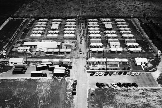 The McAllen Detention Camp in south Texas, shown here in 1954, housed Mexicans awaiting deportation. Migrants deplored the overcrowding and abysmal conditions at the camp, which was the site of several escape attempts and demonstrations. Courtesy National Border Patrol Museum, photo #03488.