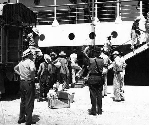 After using Immigration and Naturalization Service trucks and buses to transport deportees from the McAllen Detention Camp to Port Isabel, Texas, authorities loaded them on to privately contracted cargo ships bound for Veracruz, Mexico, such as the one shown here in 1955. Courtesy National Border Patrol Museum, photo #04011.