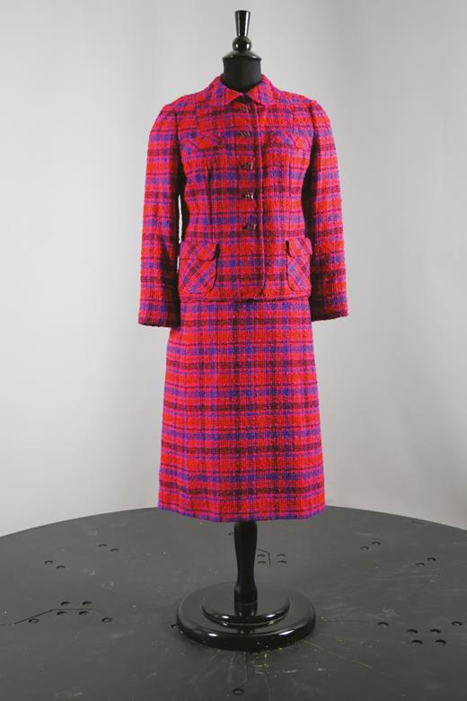 1958 Jack Clarke suit sold by G. Fox & Company, Hartford, Connecticut. This 1958 red, fuchsia, purple, and blue plaid wool Jack Clarke suit, sold by Hartford, Connecticut department store, G. Fox & Company, was owned by Eleanor Hotte, who taught Costume Design at UConn’s School of Home Economics in the late 1960s. Photo and details courtesy of Prof. Laura Crow and UConn’s Costume and Textile Collection.