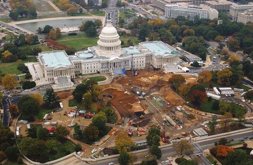 This aerial photograph was taken during the construction of the U.S. Capitol Visitor Center along the east portion of the U.S. Capitol Building in 2004. The image illustrates the amount of construction and disturbance that frequently occurs across the AOC property, which consequently, negatively impacts the overall health of the landscape plantings in the affected areas.