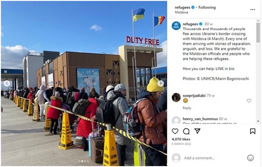 Screenshot of a UNHCR Instagram post depicting a group of people lining up in front of a building with the Ukrainian and Moldovan flags.