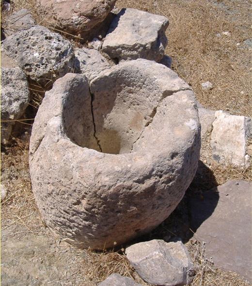 Late Bronze Age stone mortar for pounding cereals at Gournia, Crete. Photo: J. Day.