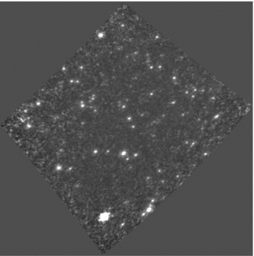 Simulated 8-s snapshot image with 512T uv coverage. The black and white scale runs between −1 and 2 Jy beam−1. The very good synthesized beam has low sidelobe levels and makes most of the sources directly visible without any subtraction.