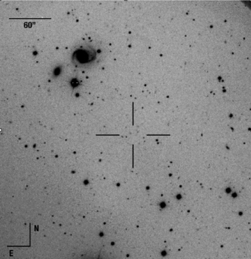 An image of the field of PTF10ops (located at the centre of the cross-hairs) taken with the WHT+ACAM with 0.25 arcsec per pixel. The largest galaxy located in the upper left quadrant has a projected separation from PTF10ops of 115.2 arcsec (1.92 arcmin), which at zcmb = 0.062 corresponds to 148.3 kpc.