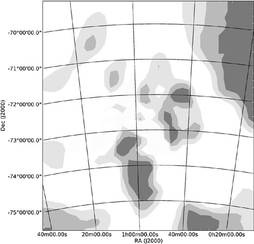 A 6$_{.}^{\circ}$0 × 6$_{.}^{\circ}$5 contour map of the statistical likelihood that the features in the galaxy rest-frame velocity surface are not merely due to chance (P = 0.95–0.99 in light grey, P = 0.99–0.999 in grey and P > 0.999 in dark grey).