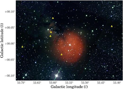 IPHAS image mosaic of ${\rm H\,\small {II}}$ region Sh 2-82, composed of Hα (red channel), r (green channel), and i (blue channel). Yellow triangles show the position of candidate Hα emitters which have been selected from the colour–colour diagram in Fig. 20.