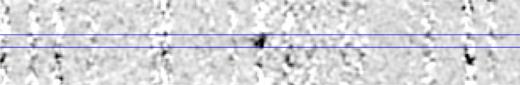 Sky-subtracted, co-added nIR spectra from NIRSPEC on Keck II showing the possible Hα line at 1.977 μm (z = 2.012) at the centre of the image. This line falls on top of a sky emission feature, but is located directly at the position of the host galaxy, labelled in blue, and corresponds to a redshift consistent with the narrow range derived photometrically (see Section 3.3).