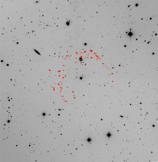 Deep image of the entire field of view, with contours (in red) of the most prominent emission-line blobs around AT Cnc. The field of view is 11 × 11 arcmin2, with north at the top and east to the left. Numerous galaxies are seen in the field, some of which having redshifts that put their emission lines in the SN3 filter. They will be discussed in Drissen et al. (in preparation).