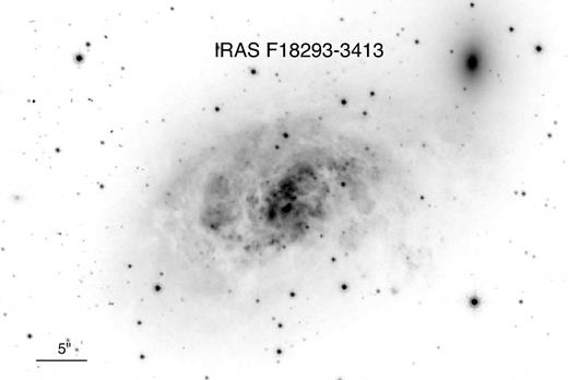 HST image of IRAS F18293−3413 (HSTF814W; 5 arcsec ≃ 1.8 kpc).