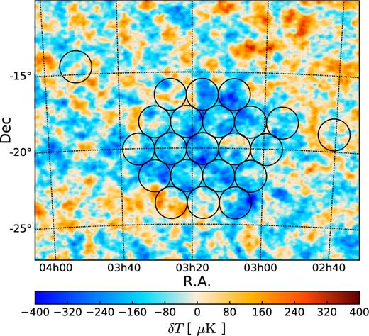 The 2CSz survey geometry. Superimposed on the Planck SMICA map of the CMB Cold Spot are circles representing the 22 3 deg2 galaxy redshift fields observed using AAT 2dF+AAOmega. 20 of these fields lie within a 5° radius of the Cold Spot centre.