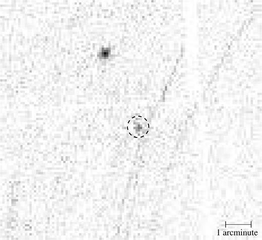 The image of the field near SAX J1750.8-2900 (indicated by the dashed circle of radius 25 arcsec) as obtained using the EPIC-MOS1 instrument on board XMM–Newton. The source located to the upper left is 2RXP J175029.3-285954. The stray light contamination seen in the figure is caused by another nearby bright source (outside the field of view).
