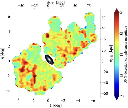 Apparent magnitudes at 50 per cent completeness for NB515 for each $0.1 \times 0.1~{\rm degree}^2$ region. The colour image of M31 observed by HSC is inserted in the centre (credit: NAOJ).