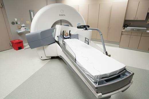 Gamma Knife Icon system with a retractable 90 kV CBCT unit mapped in submillimeter stereotactic coordinates for treatment setups. Shown is the starting position of the CBCT arm for online imaging acquisitions. This picture is provided by Dr Dheerendra Prasad, Rosswell Park, Department of Radiation Oncology.