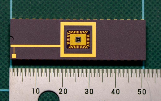 Photo of the customized MPPC or GAPD array. Common cathode and 16 anodes are connected to the pins. (Color online)