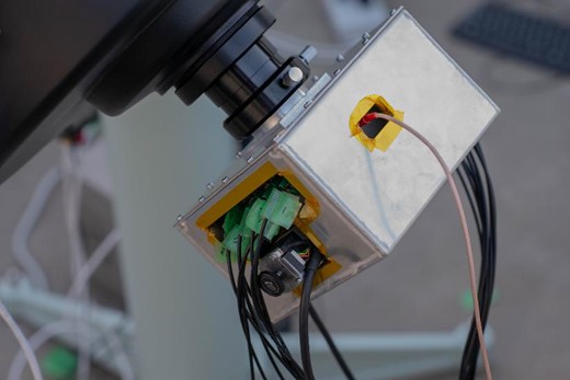 Photo of the imaging box connected to the telescope. (Color online)