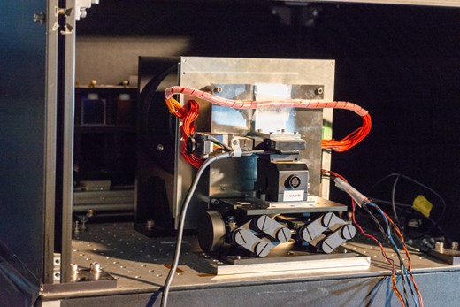 Alt Text: A photograph of IMONY, placed on the optical surface plate.