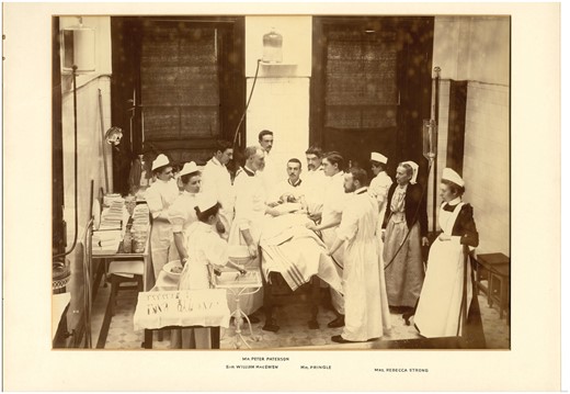 An operation at GRI conducted by William Macewen, which highlights the importance of assistance provided by both medical men and nurses, including Matron Rebecca Strong (second from right), c. 1890. With permission of NHS Greater Glasgow & Clyde