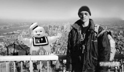 In this version of Tourist Guy, the World Trade Center is menaced by the Stay Puft Marshmallow Man from the movie Ghostbusters.