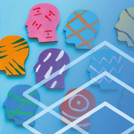 Multiple outlines of heads each featuring different colours and patterns are placed across a blue background. There is a repeating diamond outline pattern overlaying the bottom right of the image.